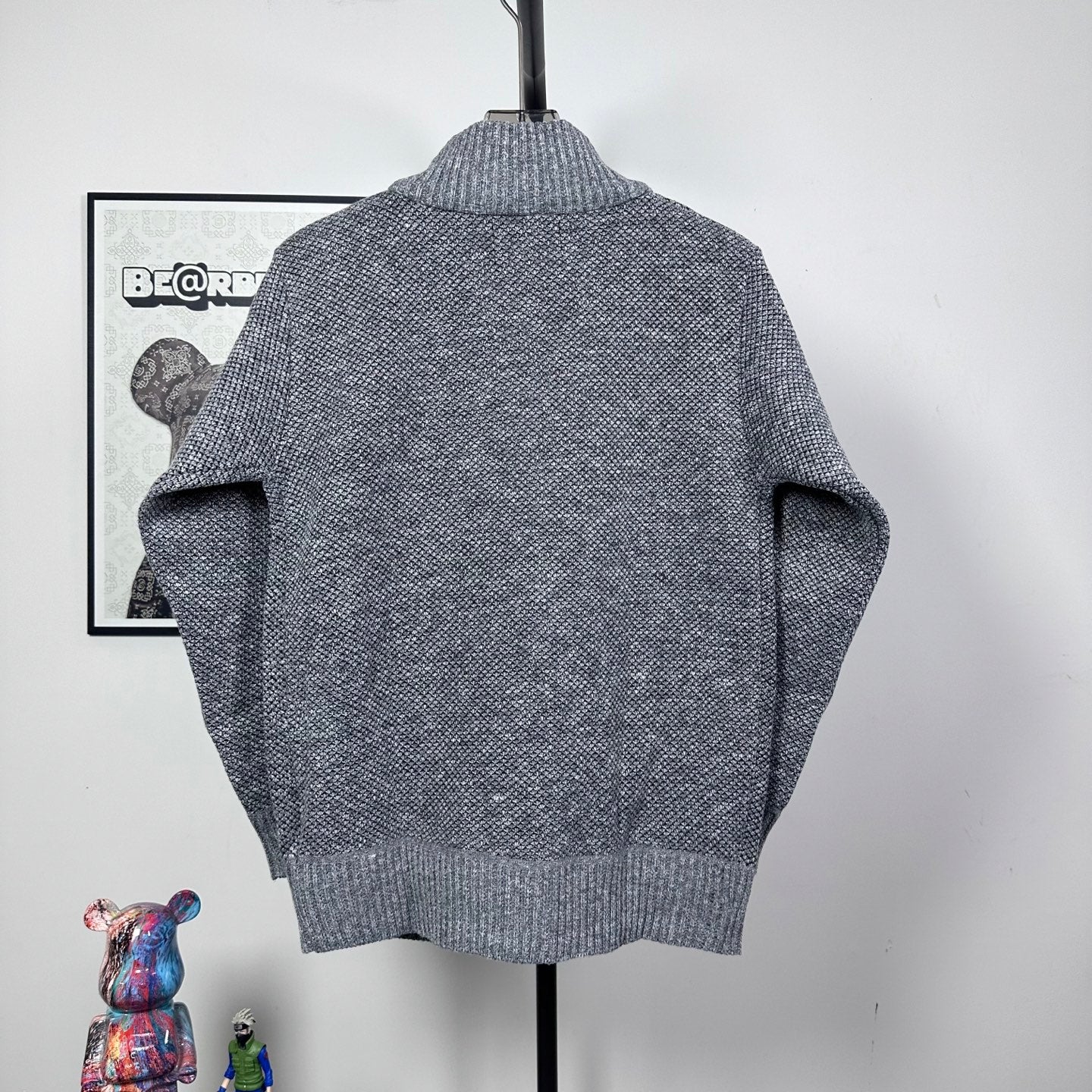 Grey textured knit jacket back view with ribbed mock neck and cuffs