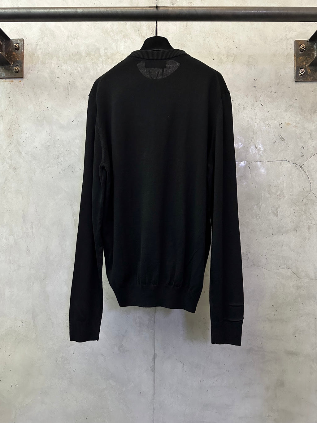 Black long-sleeve sweater, crew neck back view