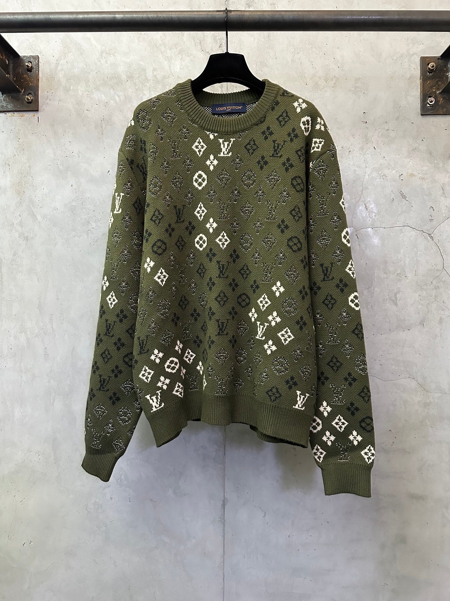 Long-sleeve knit sweater, olive green with white monogram pattern, ribbed crew neck