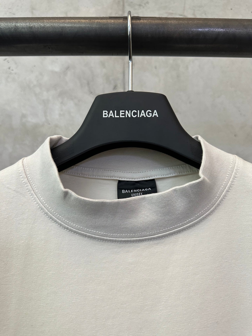 Off-white crewneck T-shirt neckline with Balenciaga label inside collar