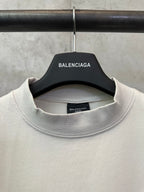 Off-white crewneck T-shirt neckline with Balenciaga label inside collar