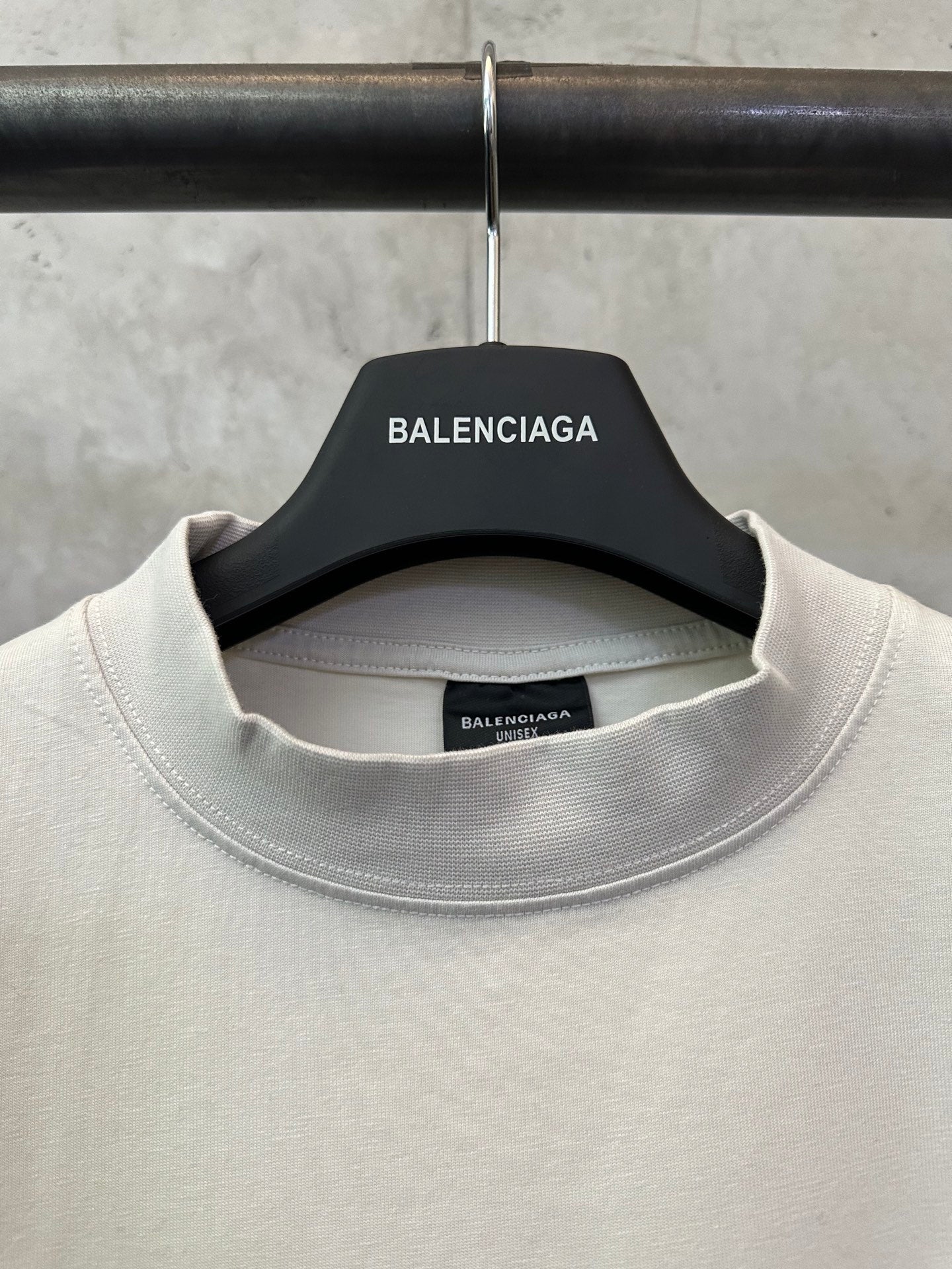 Off-white crewneck T-shirt neckline with Balenciaga label inside collar