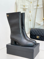 Chanel leather ankle boots with block heel and gold CC logo