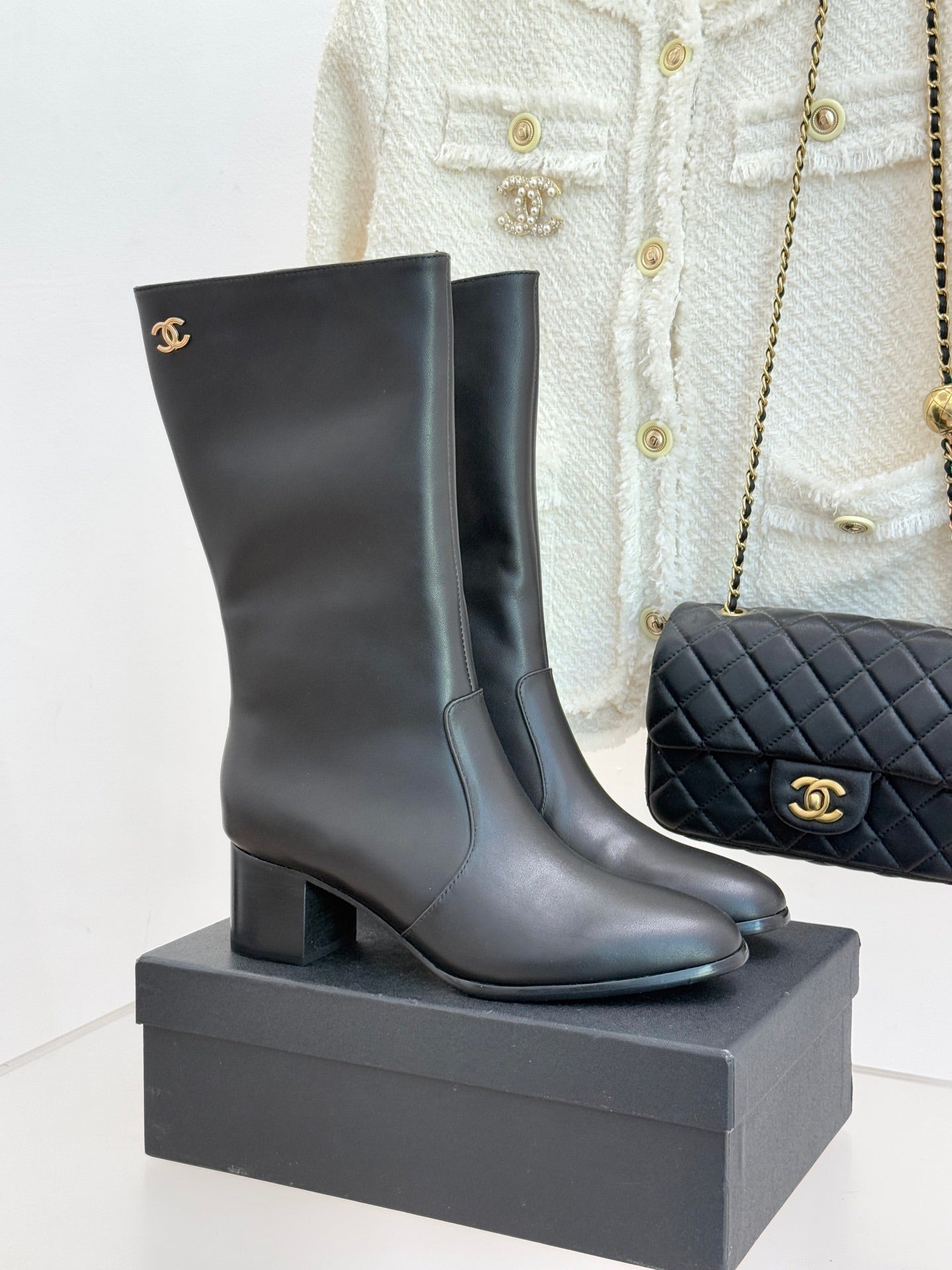 Chanel leather ankle boots with block heel and gold CC logo