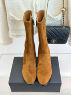 Tan suede tall heeled boots shown from front and back with side zipper tabs