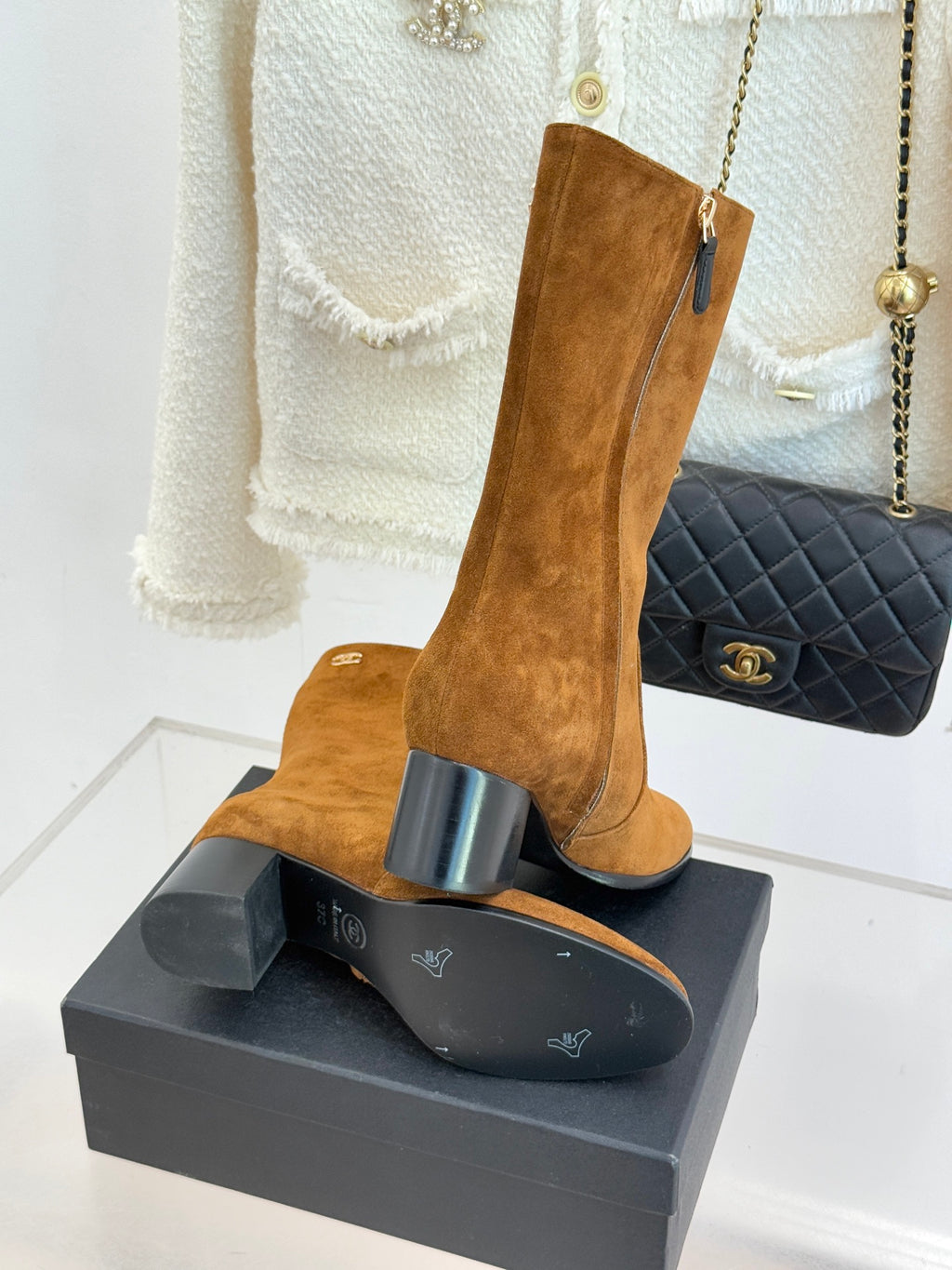 Tan suede tall heeled boots with side zipper and CC logo on cuff