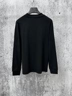 Black long-sleeve crewneck T-shirt, plain back view