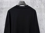 Black long-sleeve sweatshirt with ribbed crew neck, plain front