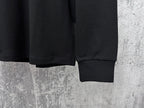Black sweatshirt sleeves with ribbed cuffs