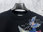 Black sweatshirt neckline with butterfly graphic detail