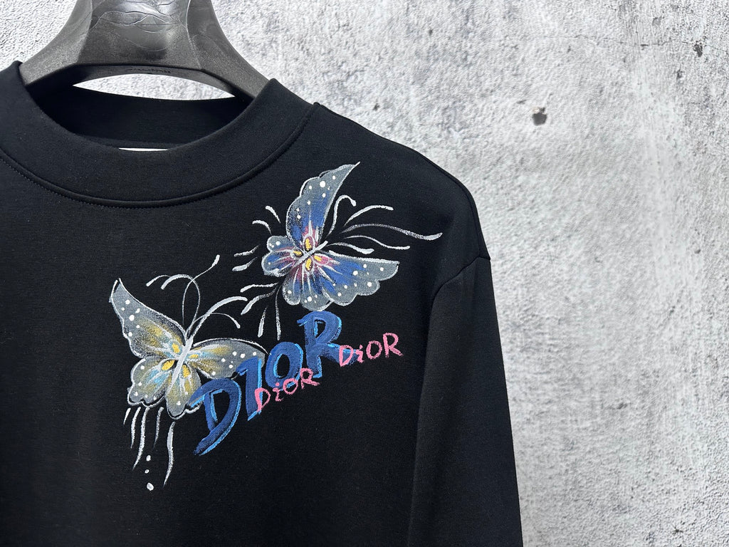 Black sweatshirt chest graphic with butterfly and Dior text