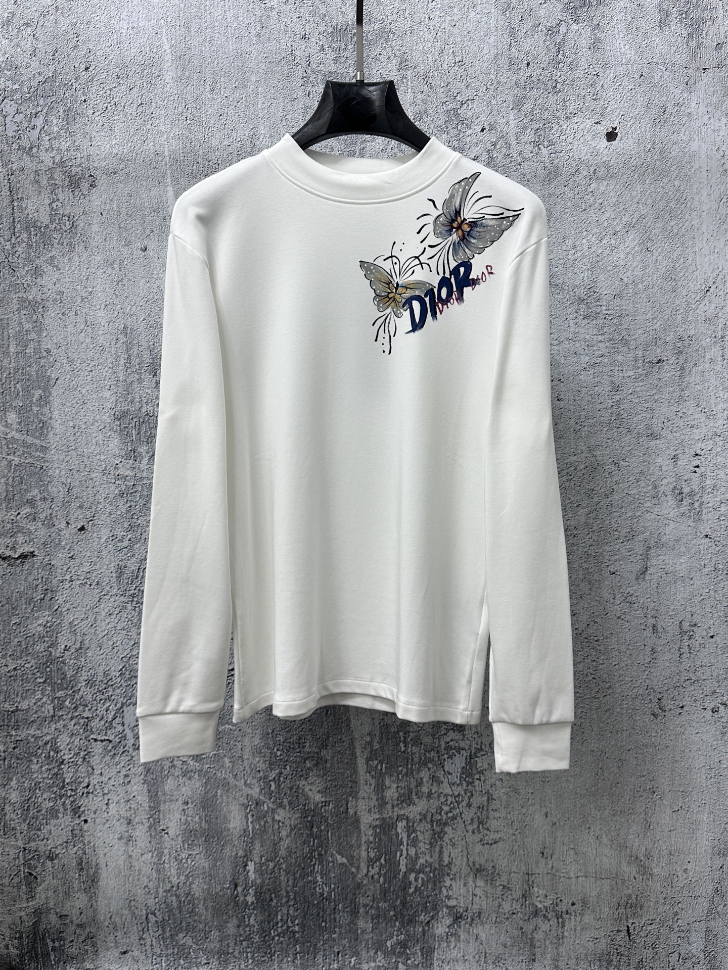White long-sleeve T-shirt with crew neck, Dior floral graphic print.