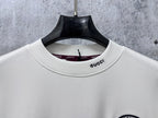 White long-sleeve T-shirt with Gucci logo at crew neck