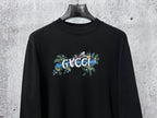 Black long-sleeve sweatshirt with Gucci floral chest logo