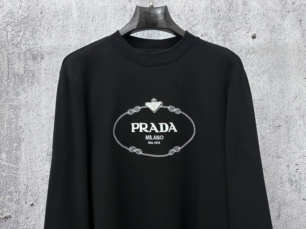 Black long-sleeve sweatshirt with PRADA Milano oval logo on chest