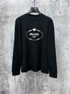 Black long-sleeve sweatshirt with PRADA Milano oval logo chest graphic