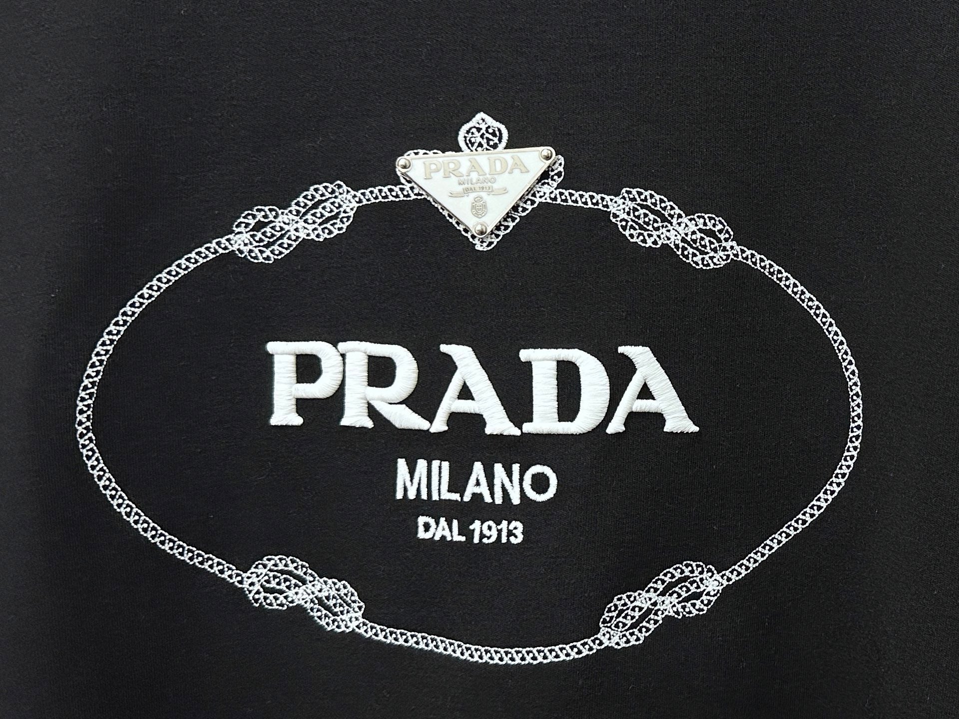 Black sweatshirt with PRADA MILANO DAL 1913 heart-shaped logo graphic