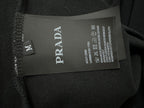 Black sweatshirt with PRADA fabric care label at side seam