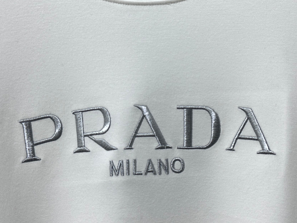 PRADA Milano logo on cream sweatshirt fabric
