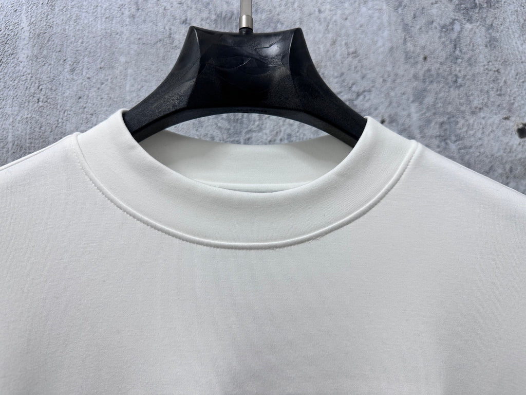 Cream crewneck sweatshirt collar with ribbed trim