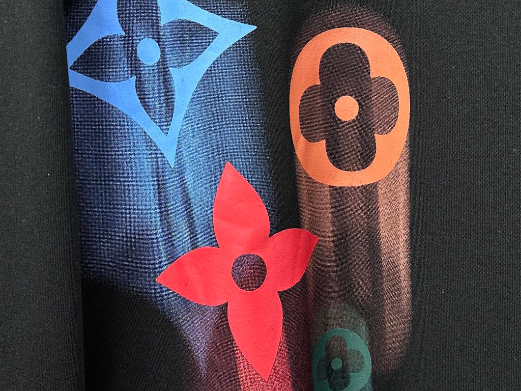 Louis Vuitton long-sleeve sweatshirt graphic close-up with blue, orange, and red shapes