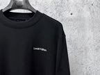 Louis Vuitton long-sleeve sweatshirt front close-up with small chest logo