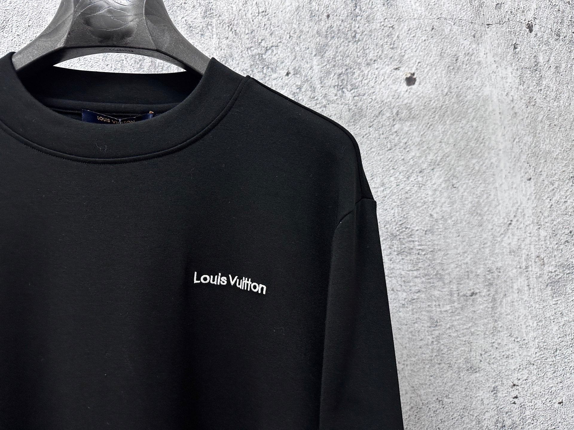 Louis Vuitton long-sleeve sweatshirt front close-up with small chest logo