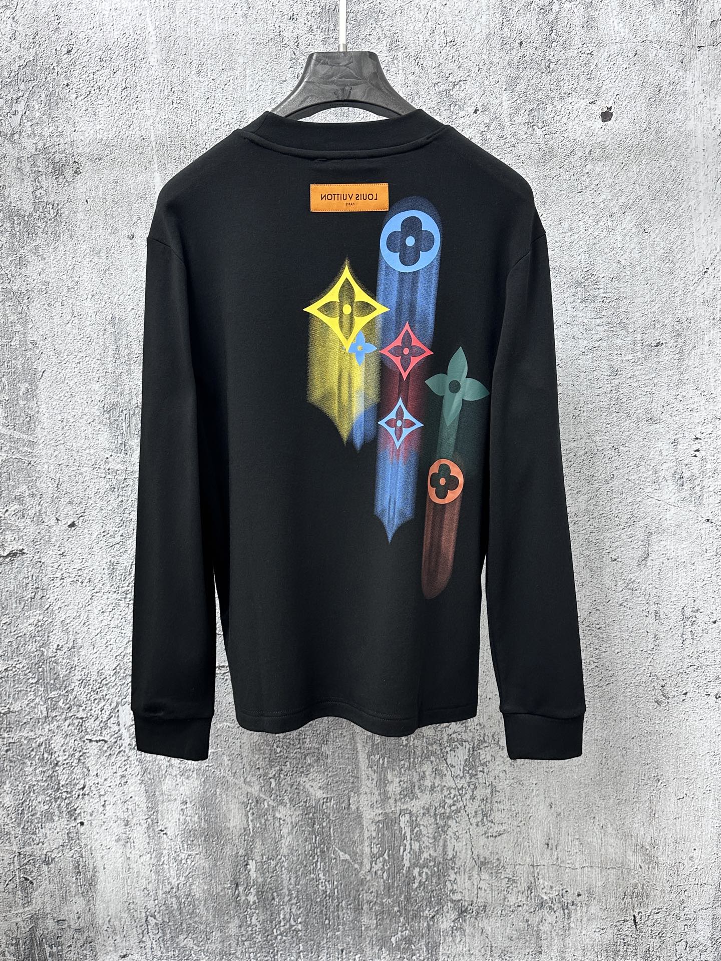 Louis Vuitton long-sleeve sweatshirt, black crewneck with colorful back graphic