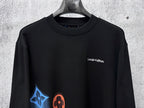 Louis Vuitton long-sleeve sweatshirt front view, black fabric with chest logo and graphic