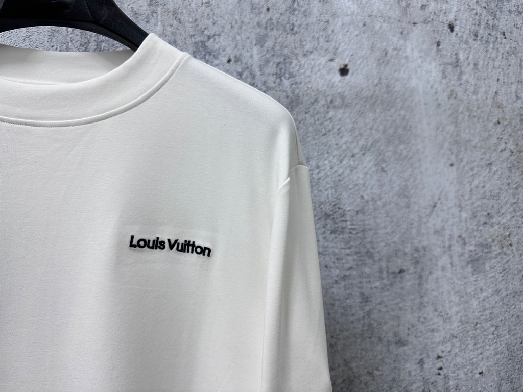White long-sleeve sweatshirt with Louis Vuitton chest logo