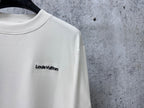 White long-sleeve sweatshirt with Louis Vuitton chest logo