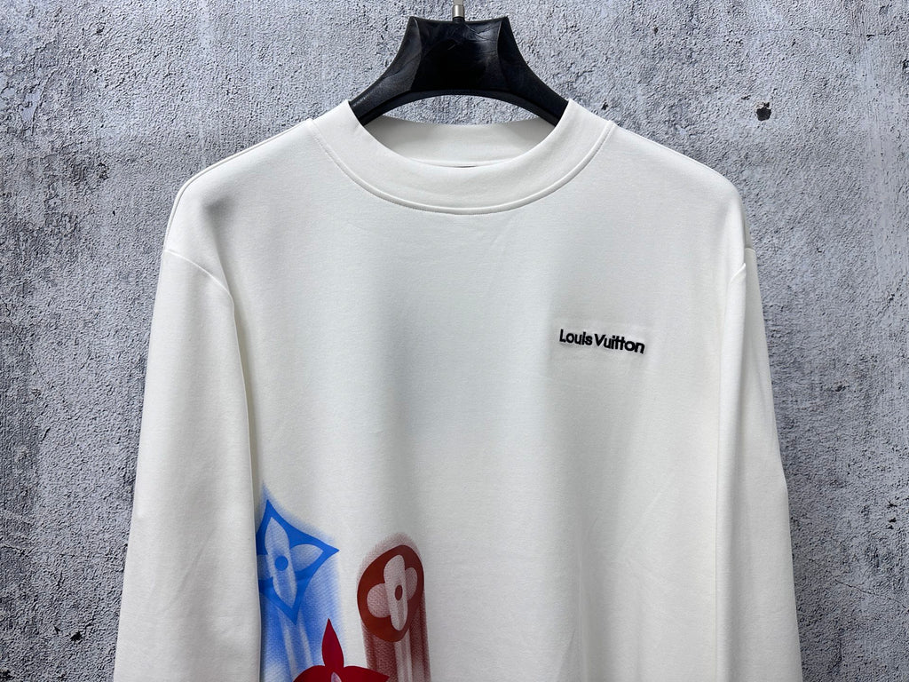 White long-sleeve sweatshirt with Louis Vuitton chest logo and colorful side print