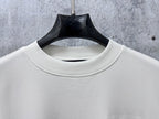 White crewneck long-sleeve sweatshirt collar and smooth fabric