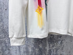 White long-sleeve sweatshirt with colorful graphic on lower sleeve