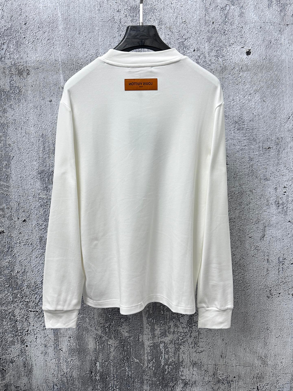 Louis Vuitton long-sleeve crewneck shirt in white, back view with neck label