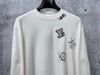 Louis Vuitton white long-sleeve crewneck shirt with front logo and character graphic
