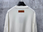 Louis Vuitton white long-sleeve crewneck shirt close-up of back with neck label