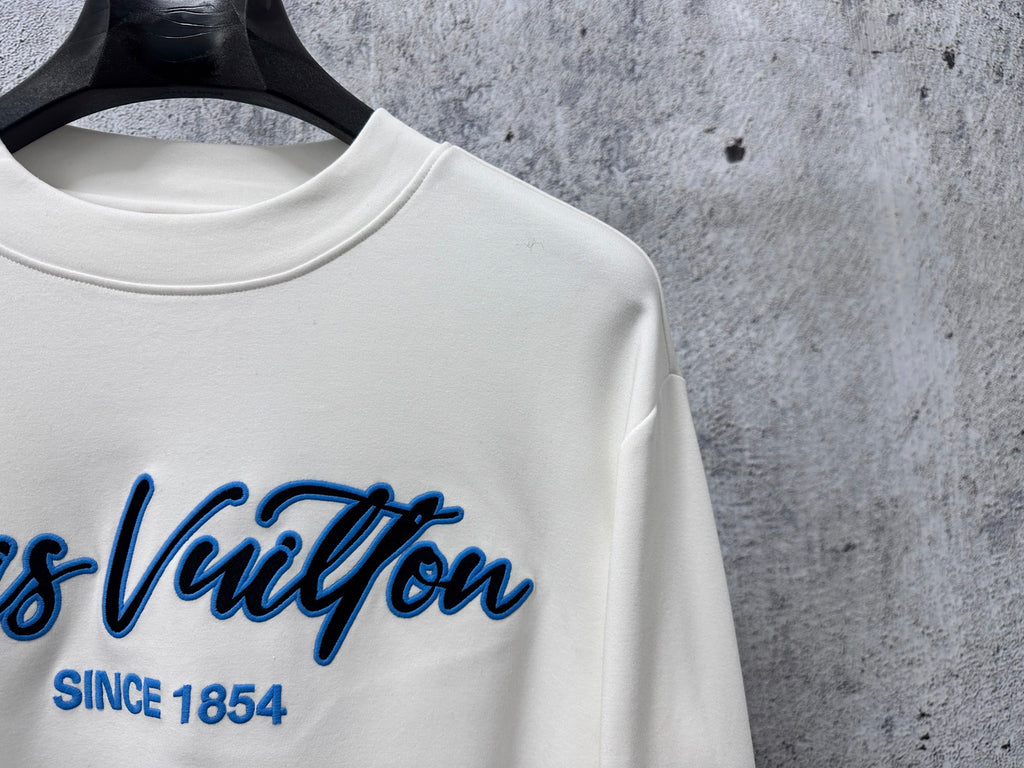 White Louis Vuitton long-sleeve T-shirt chest logo close-up with 'Since 1854'