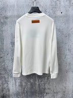White Louis Vuitton long-sleeve T-shirt back view with neck label