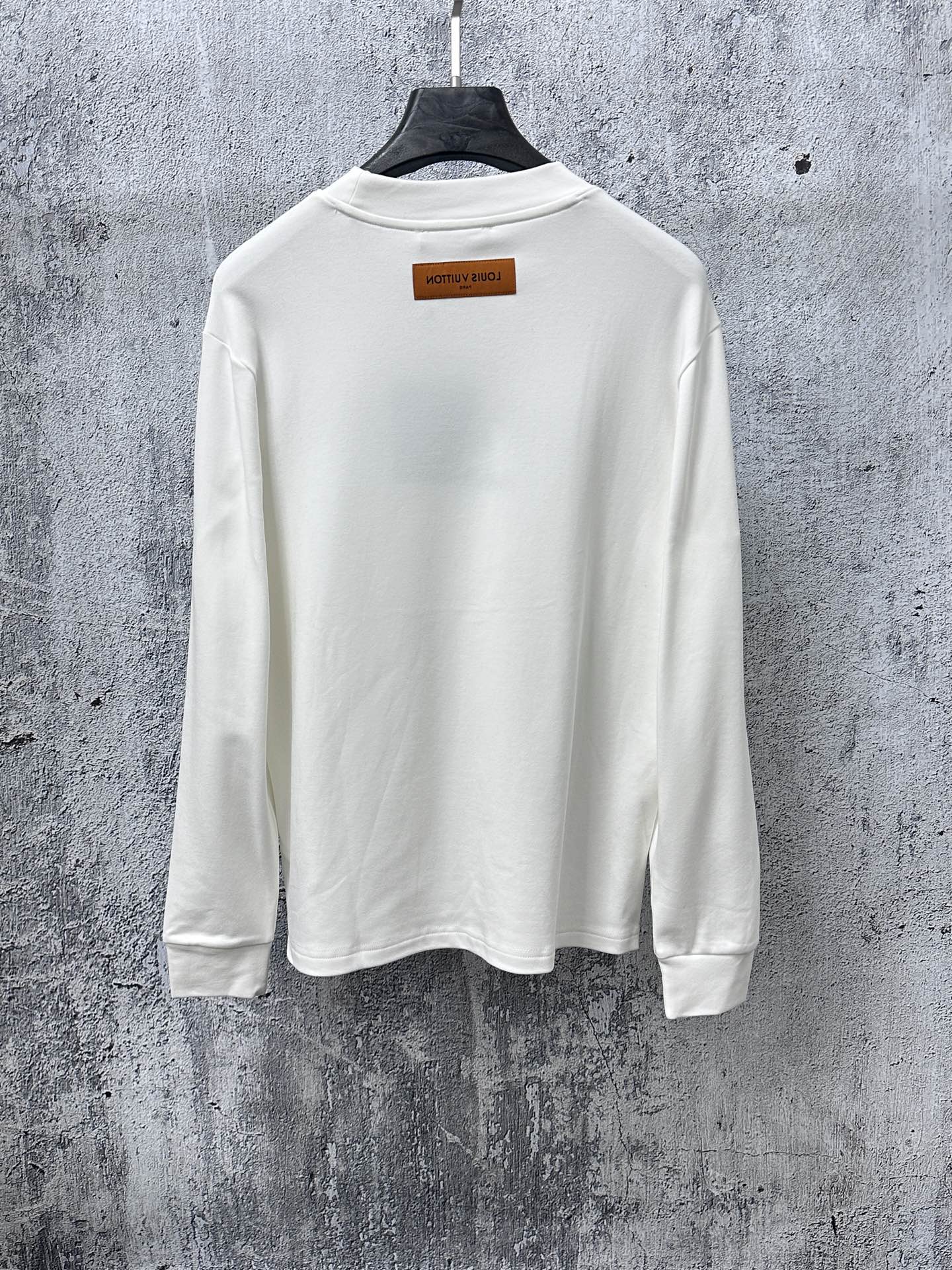 White Louis Vuitton long-sleeve T-shirt back view with neck label