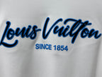 White Louis Vuitton long-sleeve T-shirt logo close-up in blue script