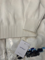 Off-White™ knit sweater sleeve and hem, off-white ribbed cuffs and knit texture