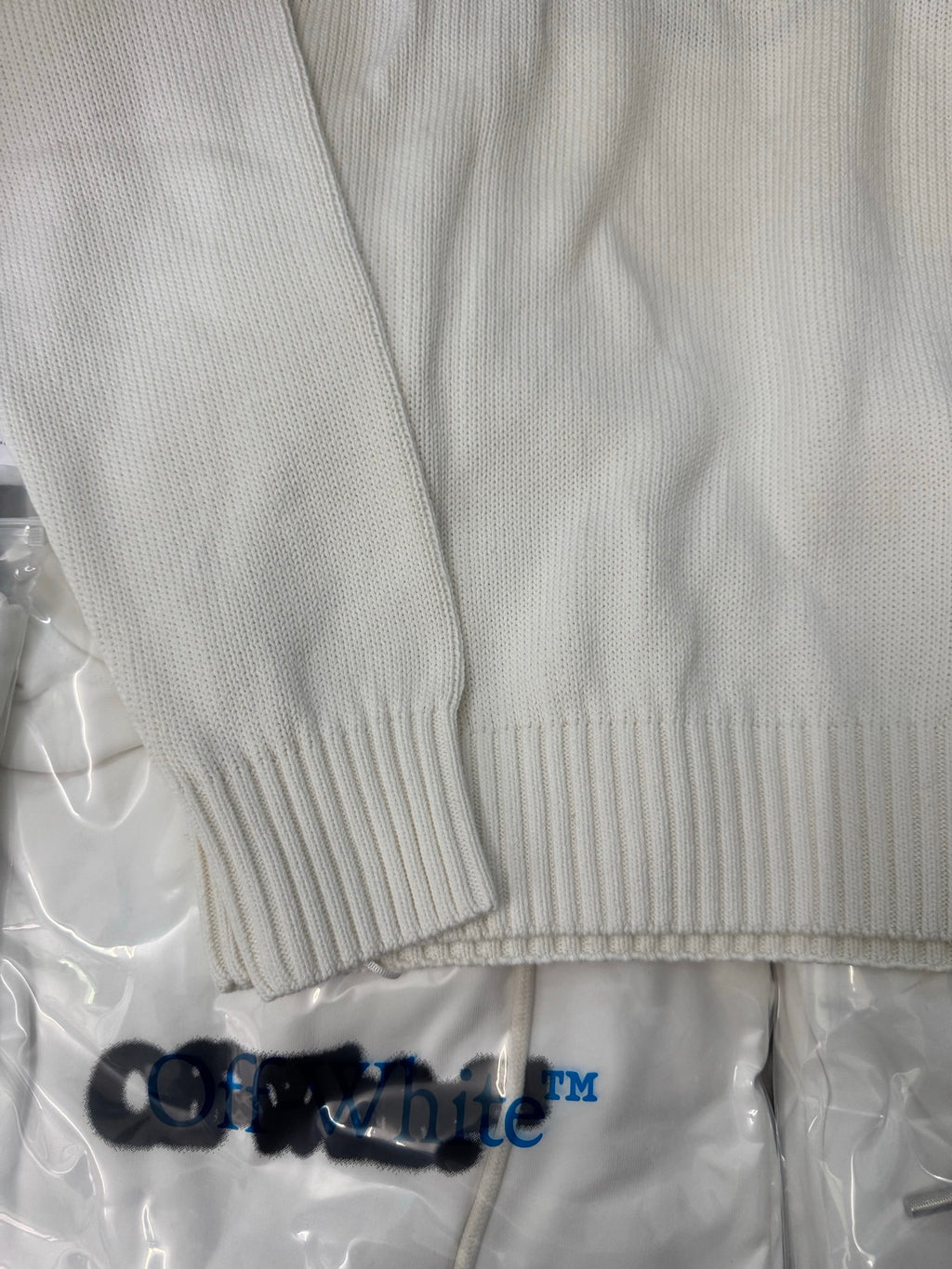 Off-White™ knit sweater back hem and sleeve cuff, off-white ribbed trim