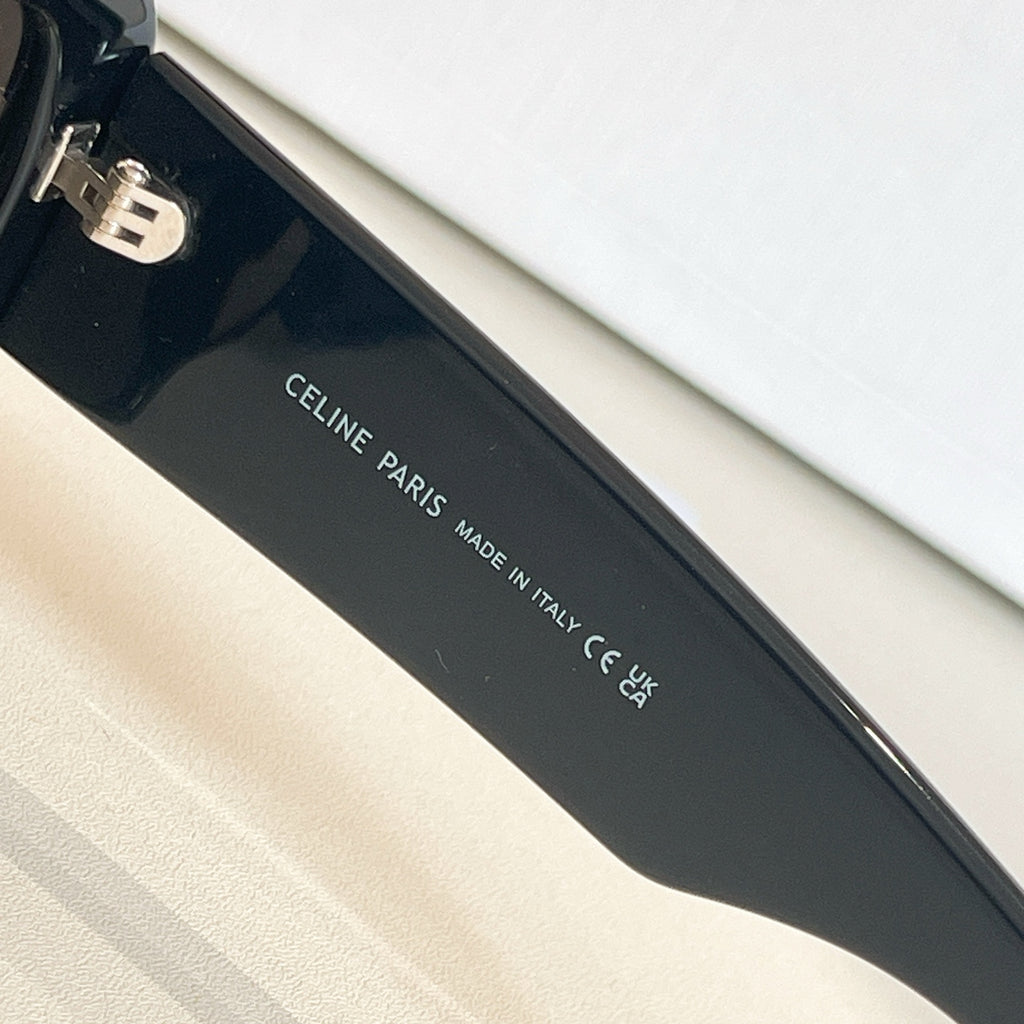 Black sunglass temple with “CELINE PARIS” and “MADE IN ITALY” text
