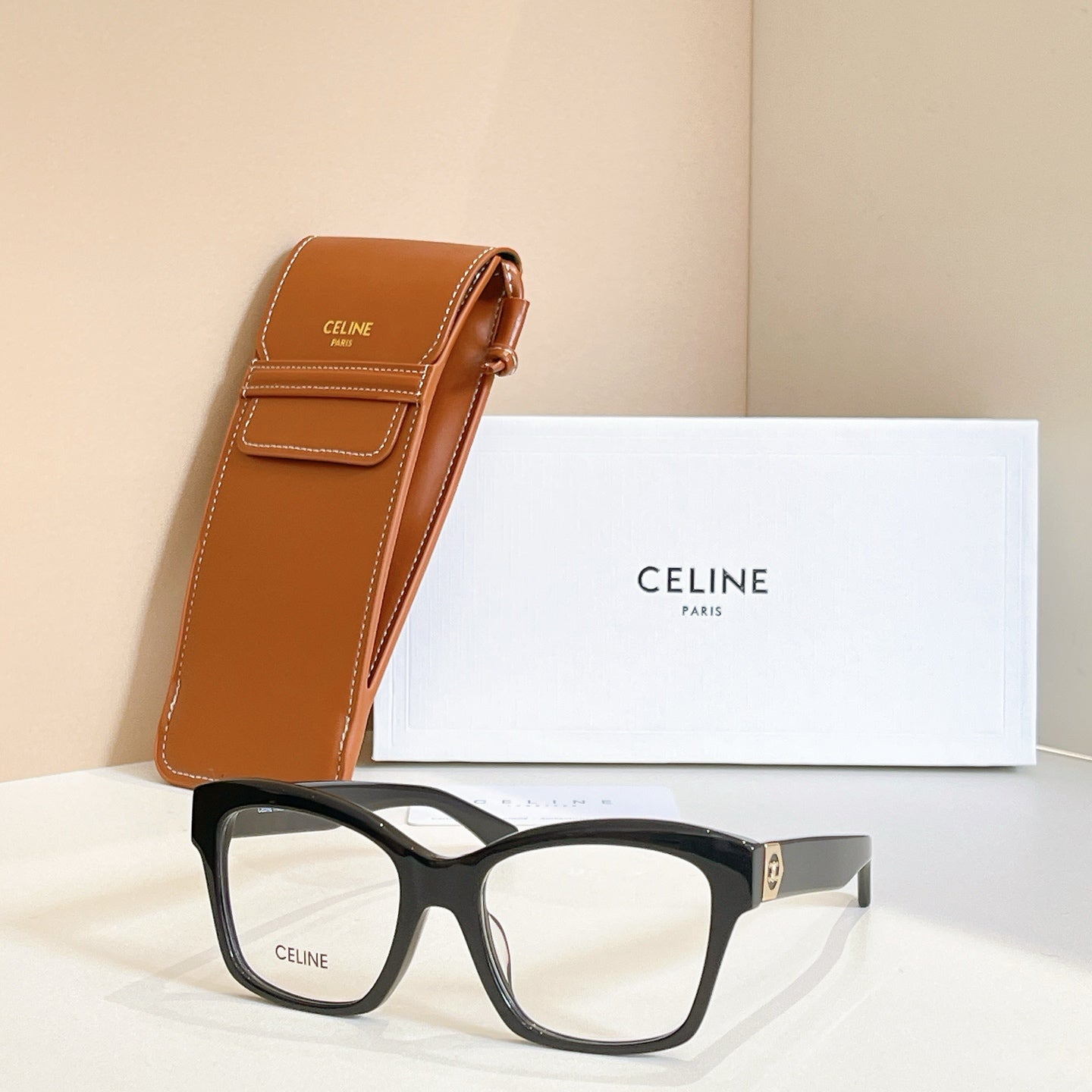 Celine glasses with black square frames and clear lenses