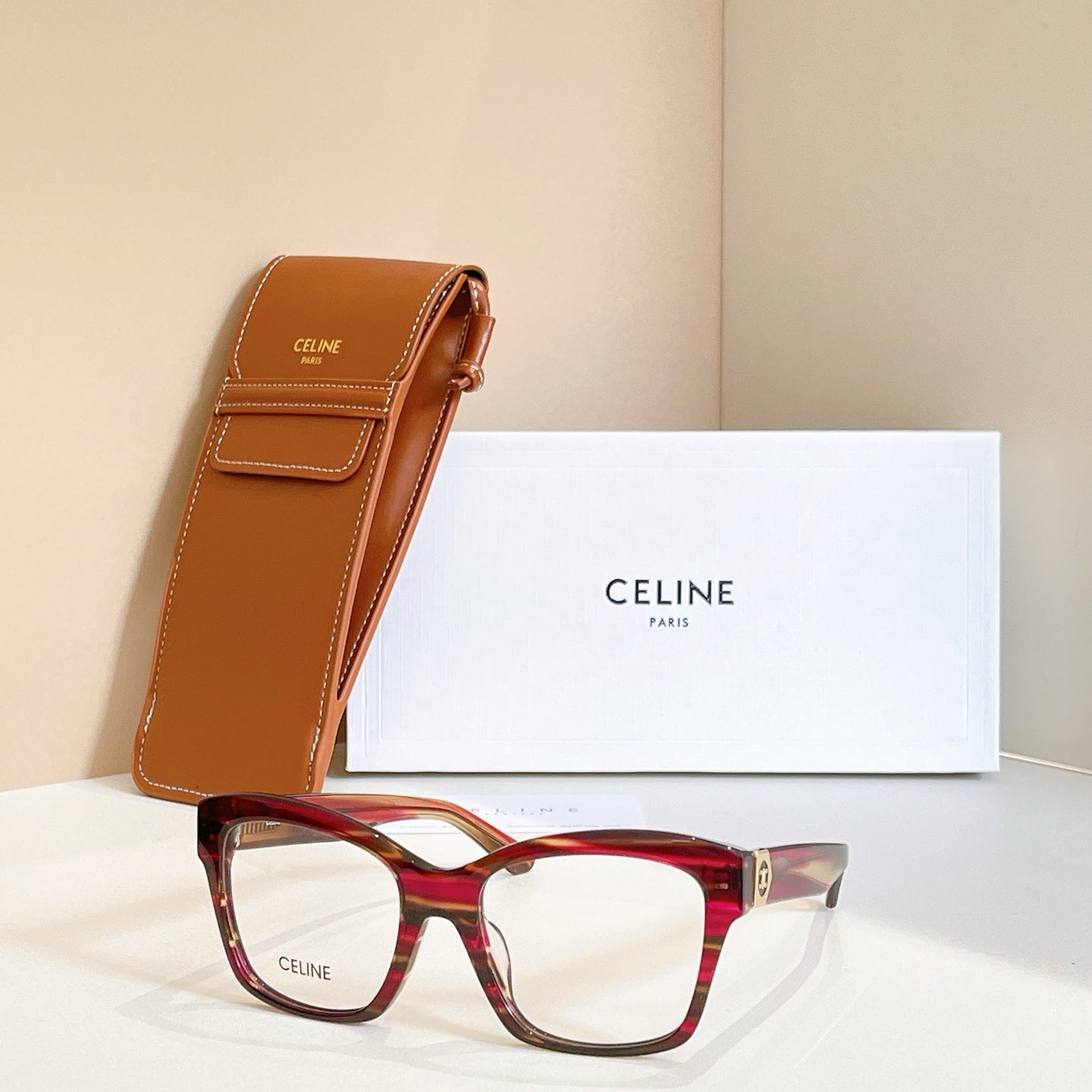 Celine glasses with red tortoise square frames and clear lenses