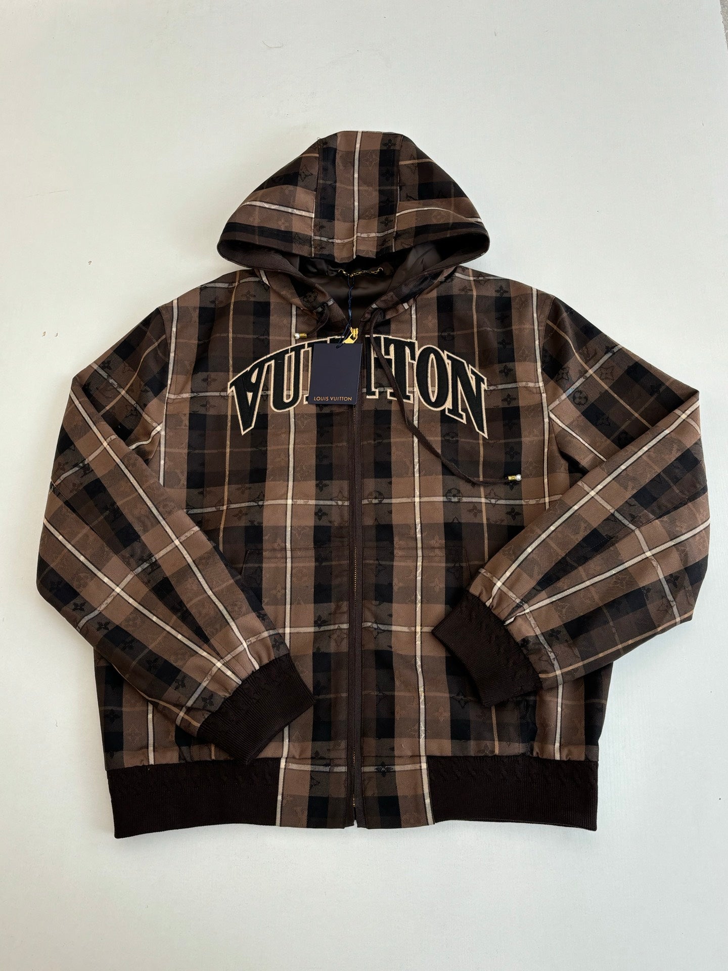 Brown plaid hooded zip jacket with bold LV logo on chest