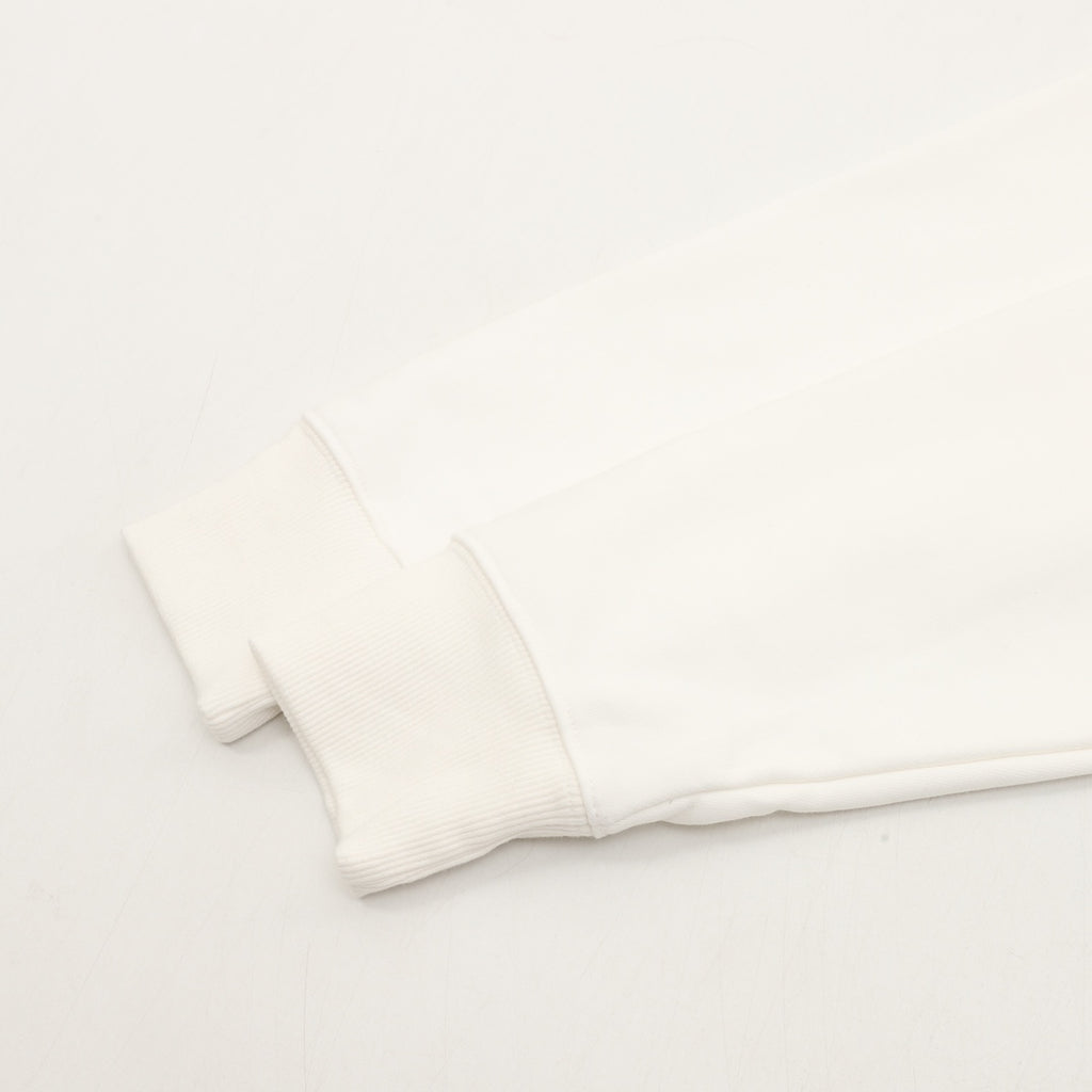 White sweatshirt sleeve cuff with ribbed trim
