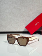 Prada glasses with brown frames and brown tinted lenses