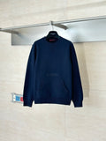Navy long-sleeve knit sweater with crew neck and small Gucci logo detail on chest